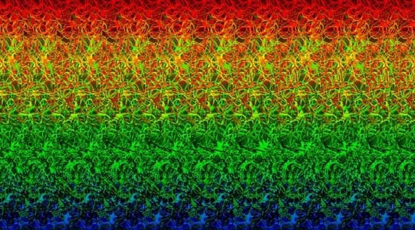 A colorful stereogram image with red, yellow, green, and blue abstract patterns. When viewed with the right technique, a hidden 3D shape or image appears.